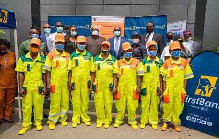 Sanwo-Olu gives uniforms to LAWMA sweepers, branded by First Bank